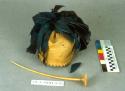 Man's hat with ivory hairpin and feathers