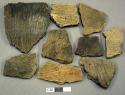 Ceramic, earthenware body sherds, cord-impressed; some mended