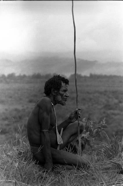 Old man watching the war