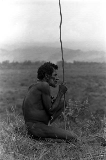 Old man watching the war