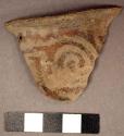 Ceramic rim sherd, flared, exterior red on buff spiral design