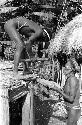 Men building the henapu
