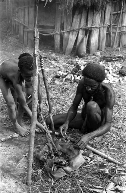 Uwar helping prepare for the ceremony