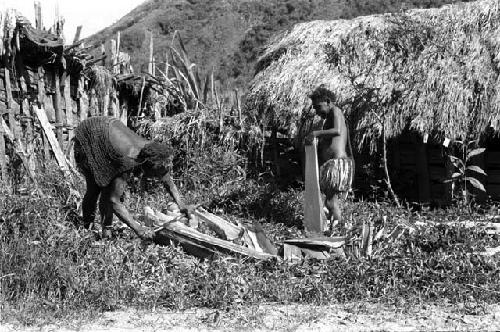 Woman peeling haki trunk