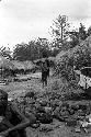 Woman standing during funeral