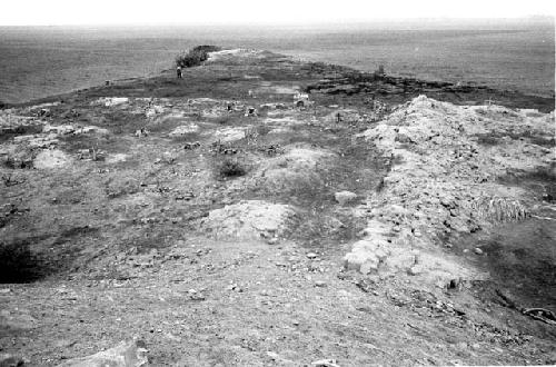 Cemetery and adobe concrete wall at Site 25