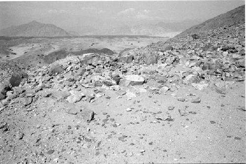 East "step" wall of large flat terrace east of upper adobe platform at Site 93