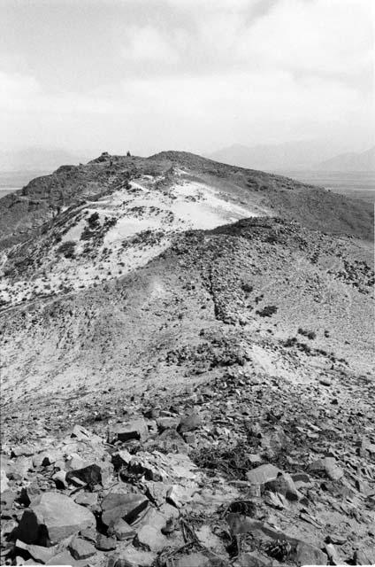 Summit with large boulder plaza and structures at Site 93