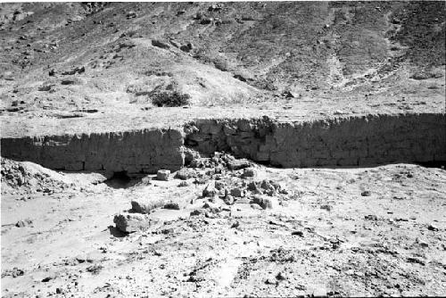 Wall with adobes and rocks behind the adobes (Feature 13)