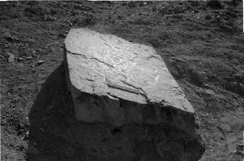 Large grinding stone on lower terraces at Site 114