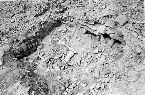 Rock masonry lining of possible tomb pit in Construction Area F at Site 123