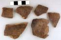 Ceramic sherds, rim and body, incised decoration