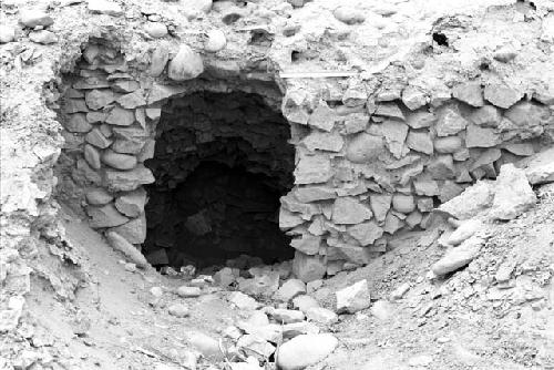 Rock wall on northwest side of Structure E at Site 128