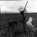 Man sharpening a stick