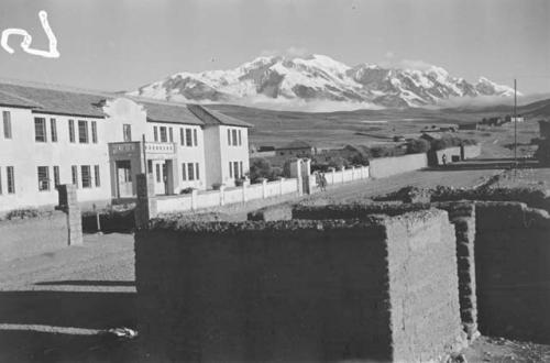 Unidentified landscape -- mountains and buildings