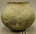 Corrugated pottery jar