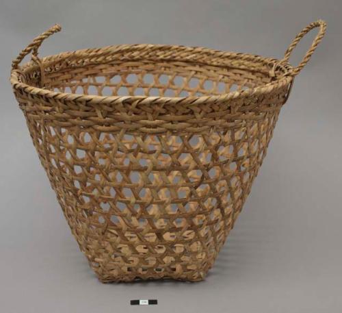 Openwork basket with two handles