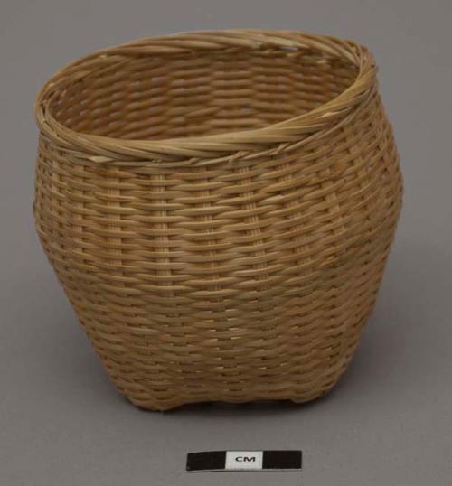 Small basket; larger of nesting pair