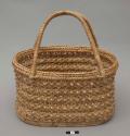 Oval-shaped basket with handles