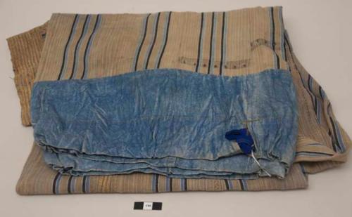 Hausa or Yoruba outfit pants; minor staining throughout; signs of machine stitching; drawstring is a later replacement.