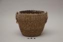 Split ash basket with handles; rim damage, fading