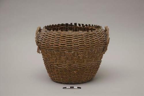 Split ash basket with handles; rim damage, fading