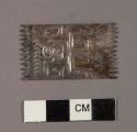 Miniature fringed textile