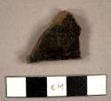 Jackfield-type sherd with black lead glaze on interior and molded ribs on exterior