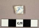 Whiteware sherd with blue transferprint on interior