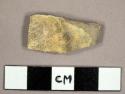 Yellow slipped earthenware sherd, burned