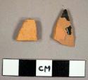 Redware sherds, one with lead glaze