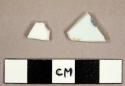 Chinese porcelain sherds, one with fragment of handpainted blue design