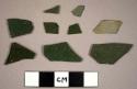 Olive green flat glass fragments