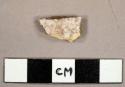 Tin glazed earthenware sherd with mottled manganese glaze