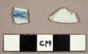 European porcelain sherds, including one rim sherd to a saucer with a hand-painted blue boarder