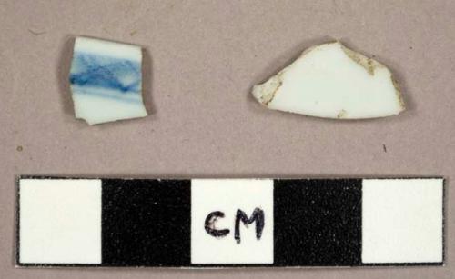 European porcelain sherds, including one rim sherd to a saucer with a hand-painted blue boarder