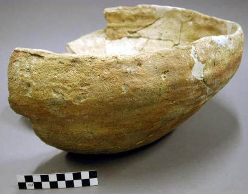 Sherds of pottery bowl--restorable. yellow