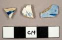 Earthenware sherds with blue hand painted decorations