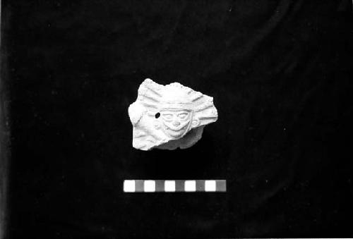 Ceramic sherd with warrior from Site 128