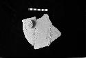 Ceramic sherd with applique lug, incisions and applique ribs with diagonal dent punctates from Site 128