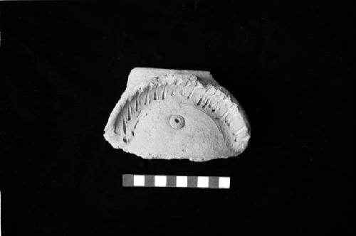 Face neck jar sherd with owl eye from Site 94