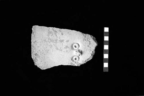 Sherd from tall everted jar neck with applique and punctate owl face, and white slip from Site 139