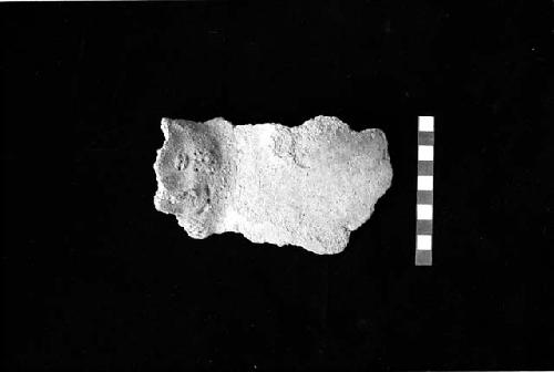 Sherd from everted neck crying face neck jar with applique and punctate from Site 130