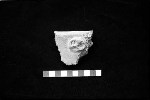 Ceramic sherd with round appique face from small Tinaja from Site 44