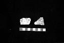 Florero sherd with warrior with snake belt from Site 134, and jar sherd with fish from Site 130