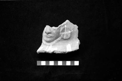 Larger mold warrior face neck sherd from Site 133