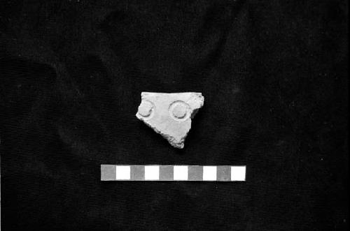 Cane stamped closed bowl sherd from Site 128