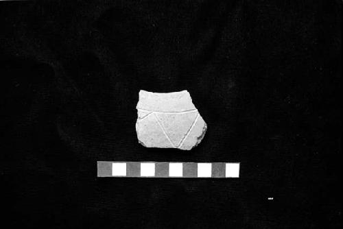 Incised polished neckless olla sherd from Site 111