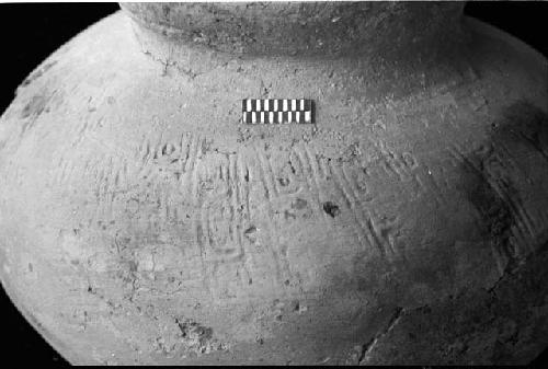 Detail of squared spiral paddle stamped vessel from Site 133