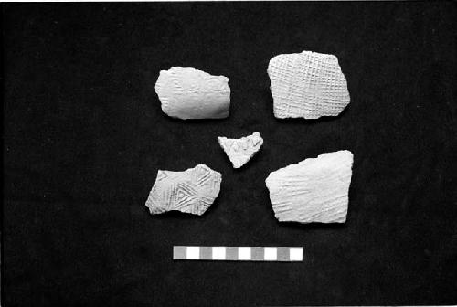 Paddle stamped ceramic sherds from Sites 128, 141 and 150